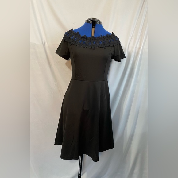 Little black dress with a gorgeous neckline! Must have for your party dresses! - Picture 1 of 12